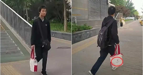 Thanh niên với vẻ ngoài nhếch nhác, nhưng khi nhìn xuống chiếc túi mà anh đang cầm, ai cũng phải "ngả mũ"