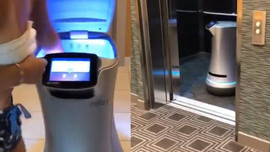 Xem clip robot đi thang máy đưa đồ cho khách
